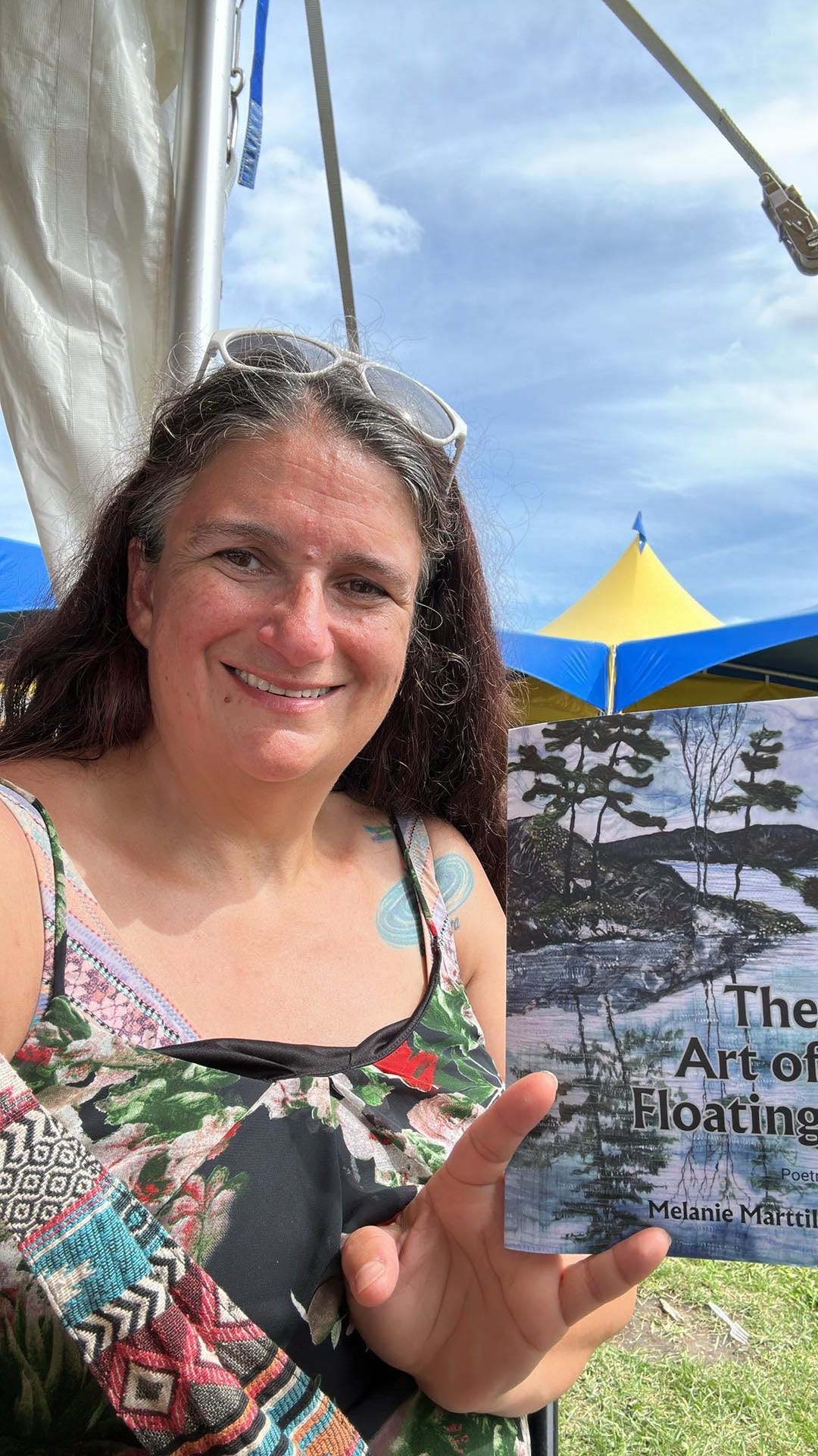 Picking up a copy of The Art of Floating at NLFB.