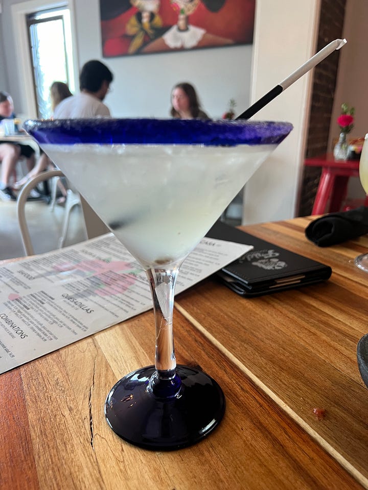 Frida’s drink menu and two different margaritas