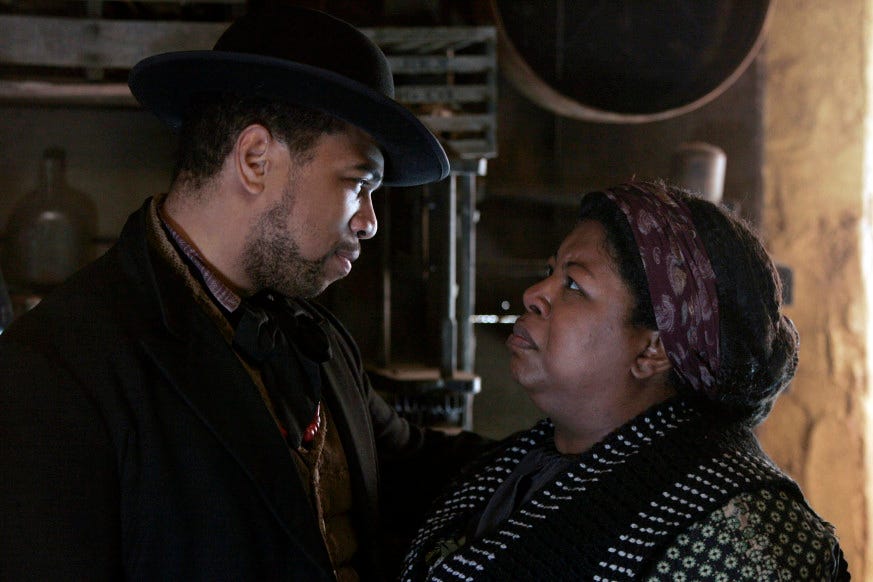 This image shows Odell Marchbanks (played by Omar Gooding) on the left and his mother, "Aunt" Lou Marchbanks (played by Cleo King) on the right. Mother and son stare directly into one another's eyes, with Lou appearing upset at something Odell has just told her. This image shows Odell Marchbanks (played by Omar Gooding) on the left and his mother, "Aunt" Lou Marchbanks (played by Cleo King) on the right. Mother and son stare directly into one another's eyes, with Lou appearing upset at something Odell has just told her.