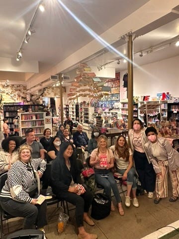 Various photos of Lauren at Because Fat Girl book events.