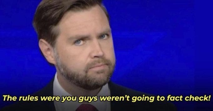 A man with short brown hair, a beard, and a neutral expression wears a dark suit and red tie, seated in front of a blue background. The overlaid text reads The rules were you guys werent going to fact check. This image satirizes JD Vances interview response regarding Tom Homans alleged acceptance of $50000 cash on an FBI surveillance tape. A man with short brown hair, a beard, and a neutral expression wears a dark suit and red tie, seated in front of a blue background. The overlaid text reads The rules were you guys werent going to fact check. This image satirizes JD Vances interview response regarding Tom Homans alleged acceptance of $50000 cash on an FBI surveillance tape.