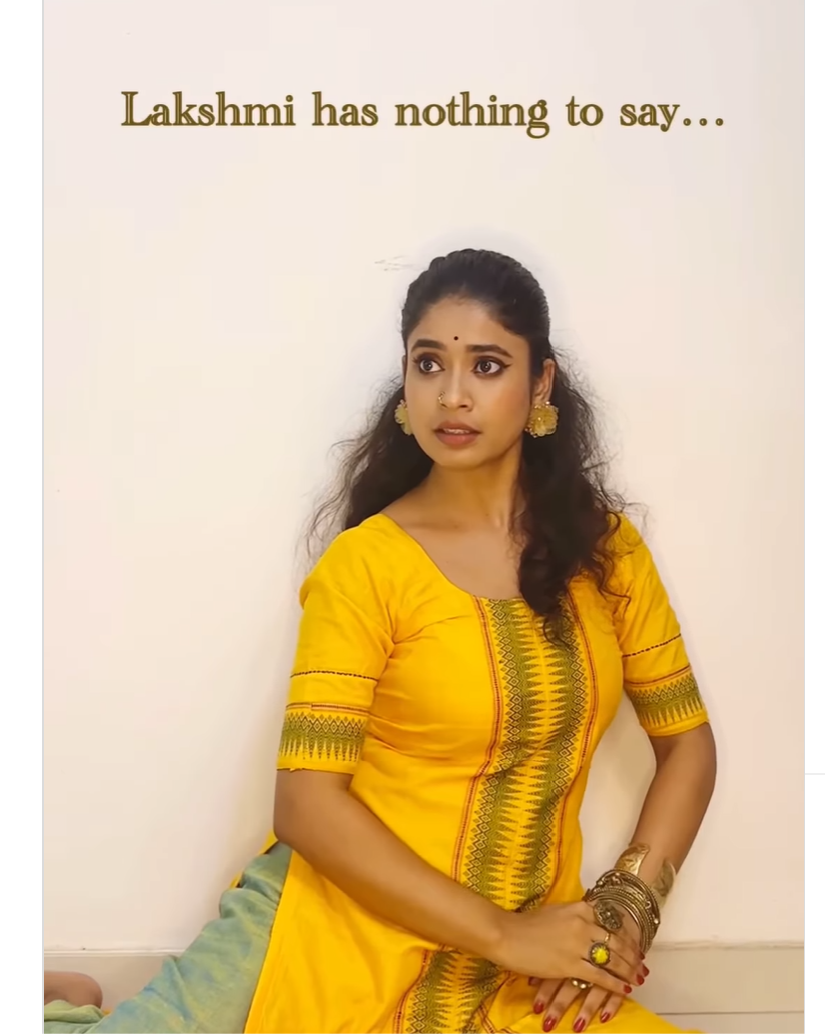 A person in a yellow dress

AI-generated content may be incorrect.