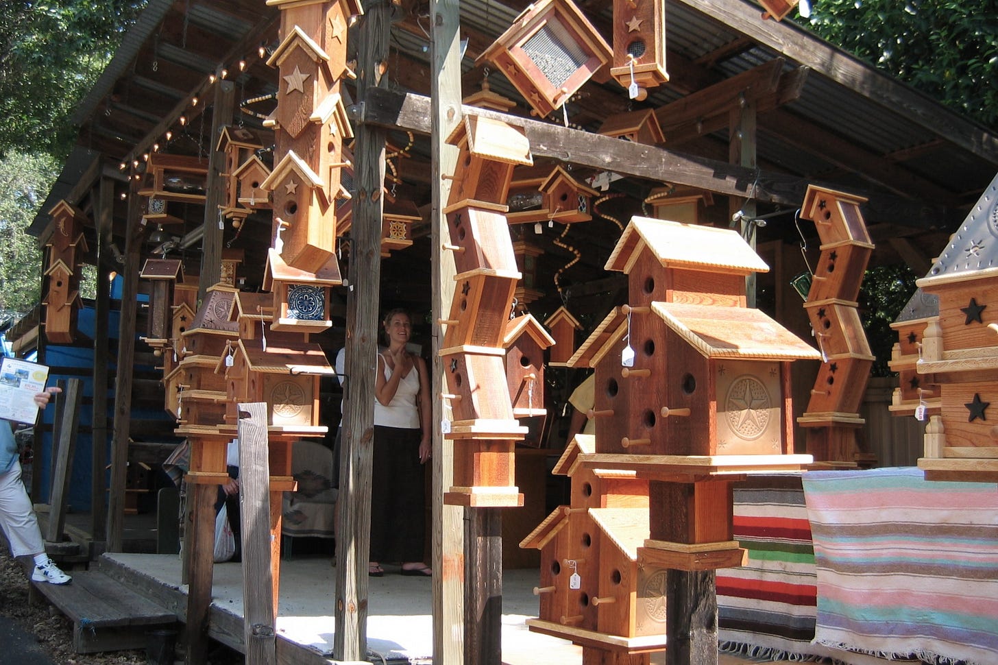 Handmade wooden birdhouses for sale at the market in Wimberley, Texas