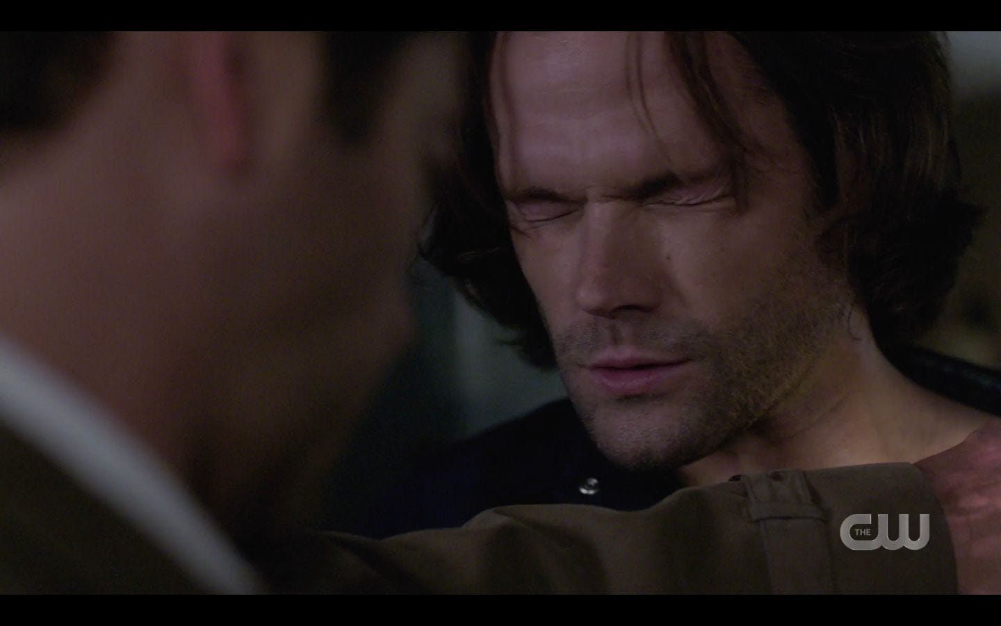 Sam Winchester squeezing eyes shut with Castiel help Sam Winchester squeezing eyes shut with Castiel help