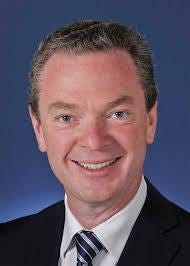 Photo of a grey haired white man with a shit-eating grin, ie Christopher Pyne