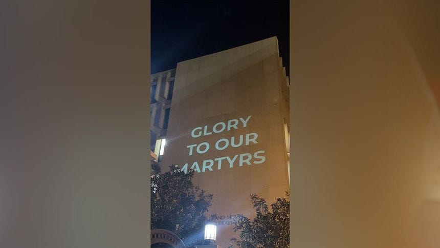 "Glory to our martyrs" sign "Glory to our martyrs" sign