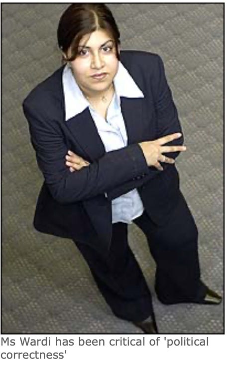 A person in a suit with her arms crossed
Description automatically generated A person in a suit with her arms crossed
Description automatically generated