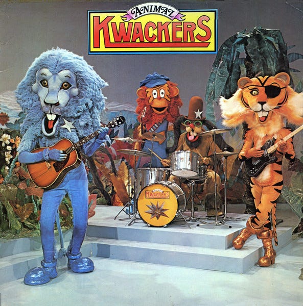 An image of a lion, tiger and monkey who are playing instruments