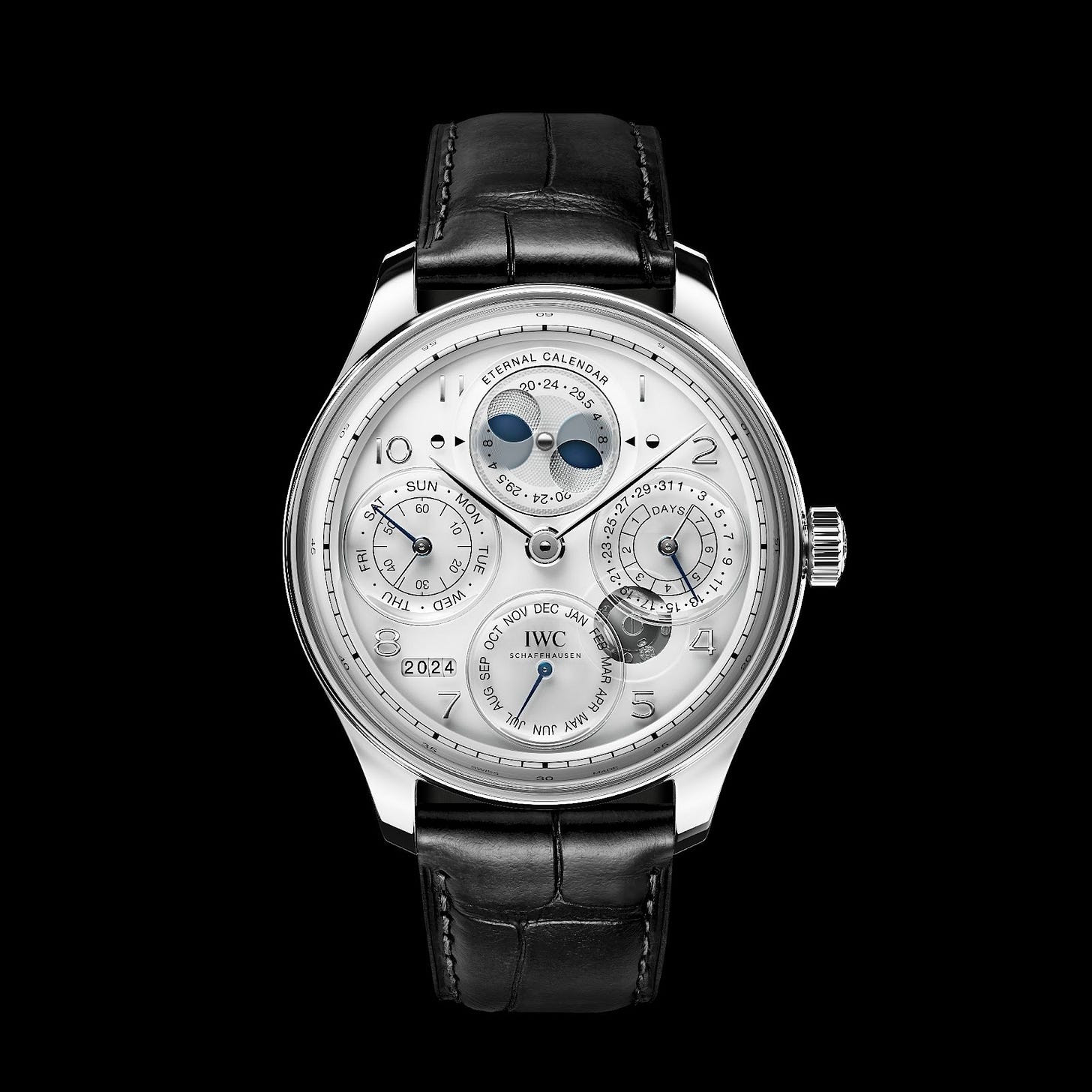 High-end perpetual calendar watch with a platinum case, lacquered dial, and moon phase requiring adjustment after 45 million years, showcasing IWC's horological innovation