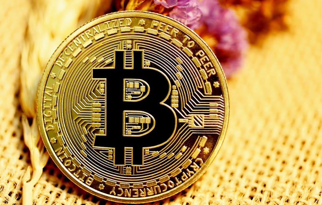 gold and black round coin