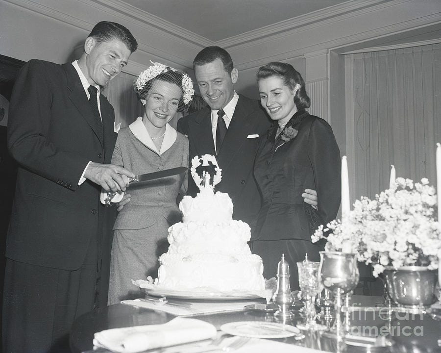 Ronald And Nancy Reagan Slicing Wedding by Bettmann