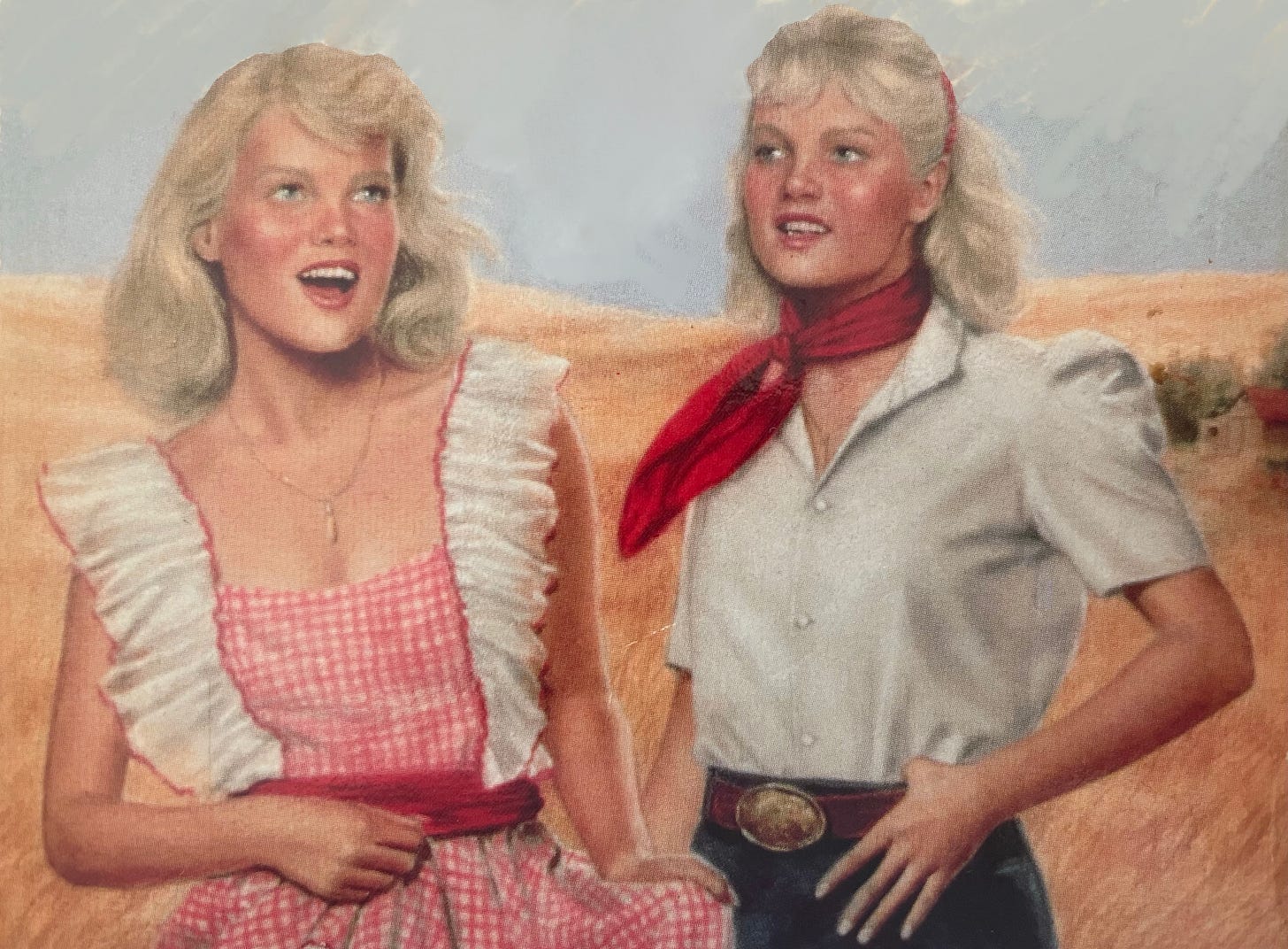 two blonde girls dressed in vaguely Western clothing, looking extremely happy to be standing in a field of wheat two blonde girls dressed in vaguely Western clothing, looking extremely happy to be standing in a field of wheat