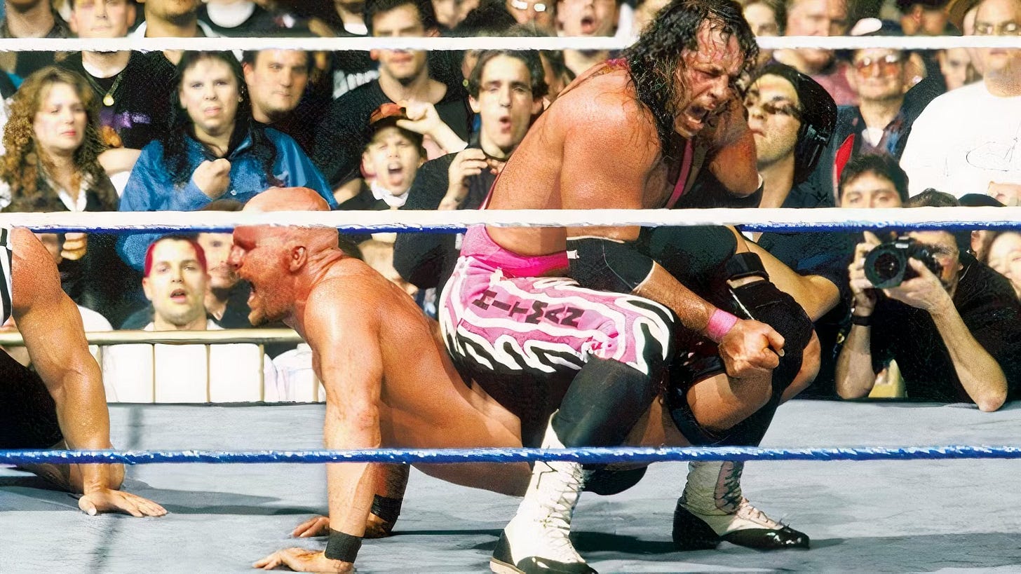 Bret Hart putting Stone Cold Steve Austin into a sharpshooter