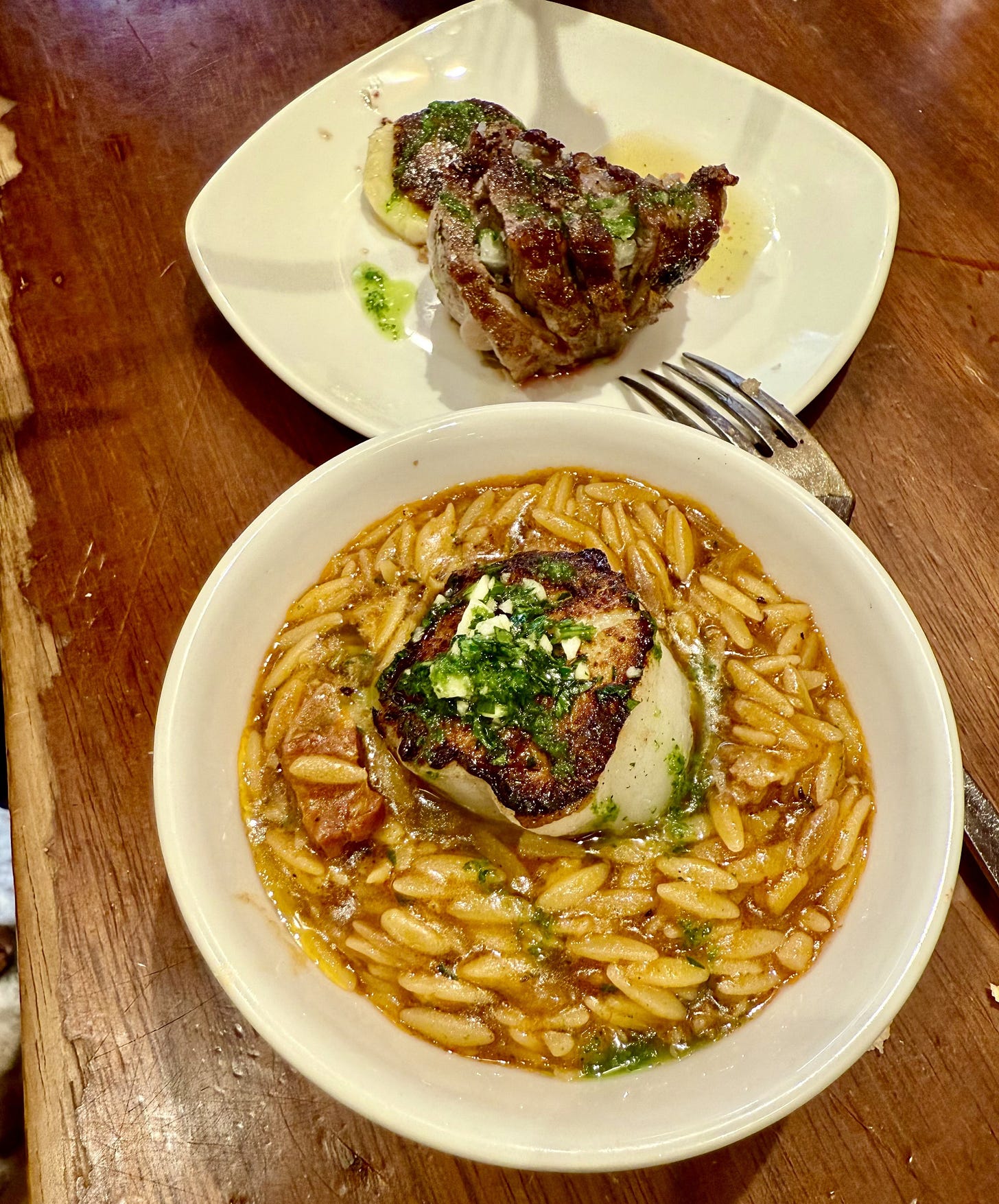 Entrecôte and scallop at La Cuchara de San Telmo