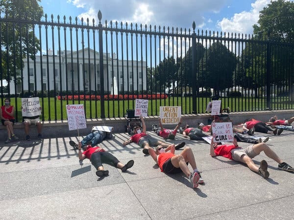 A protest in front of the White House demanding action on chronic fatigue syndrome and long Covid. A protest in front of the White House demanding action on chronic fatigue syndrome and long Covid.