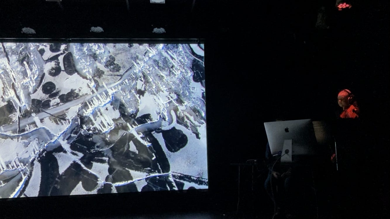 A person sitting in front of a large screen

AI-generated content may be incorrect.
