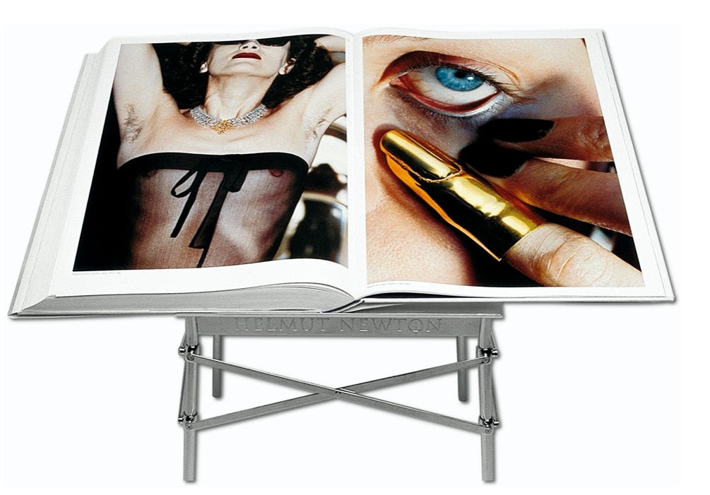 A book with a picture of a person and a golden finger

Description automatically generated