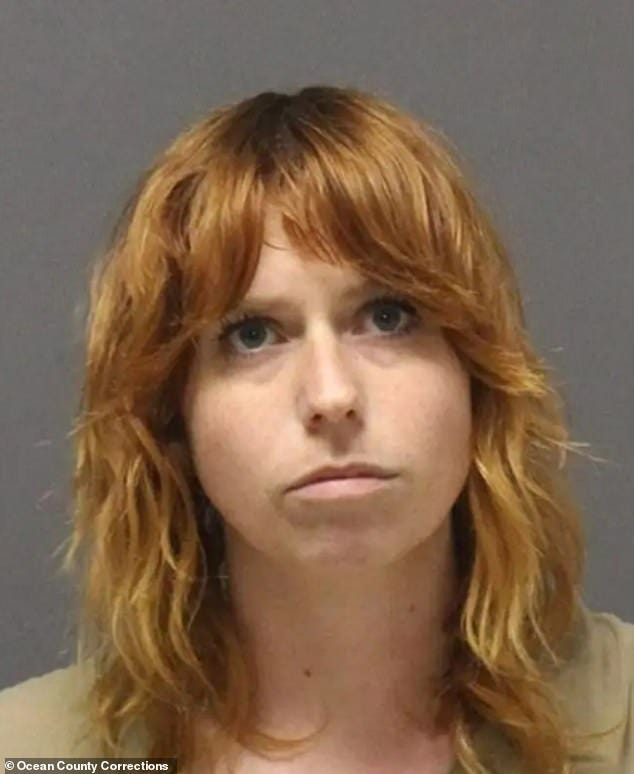 Tracey, 33, is now facing charges of endangering the welfare of a child, simple assault, harassment and obstruction, after police said she assaulted a teenage girl for wearing sweatpants with 'Trump' and 'ICE' on them