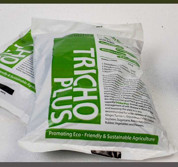 A packet of Trichoplus, Dr Varanashi's microorganism concoction to combat cacao fruit rot; Regenerative farming focuses on nurturing the soil by using bio-fertilisers and compost along with a reliable water cycle, and without machinery and chemicals