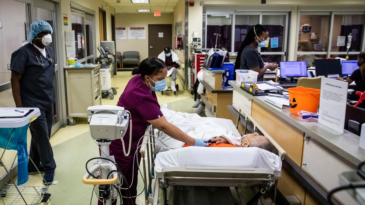 Medical assistant Cassandra Munoz checks a patient’s vitals in the hallway, as no rooms were open last week in the Emergency Department at Roseland Community Hospital on the Far South Side.