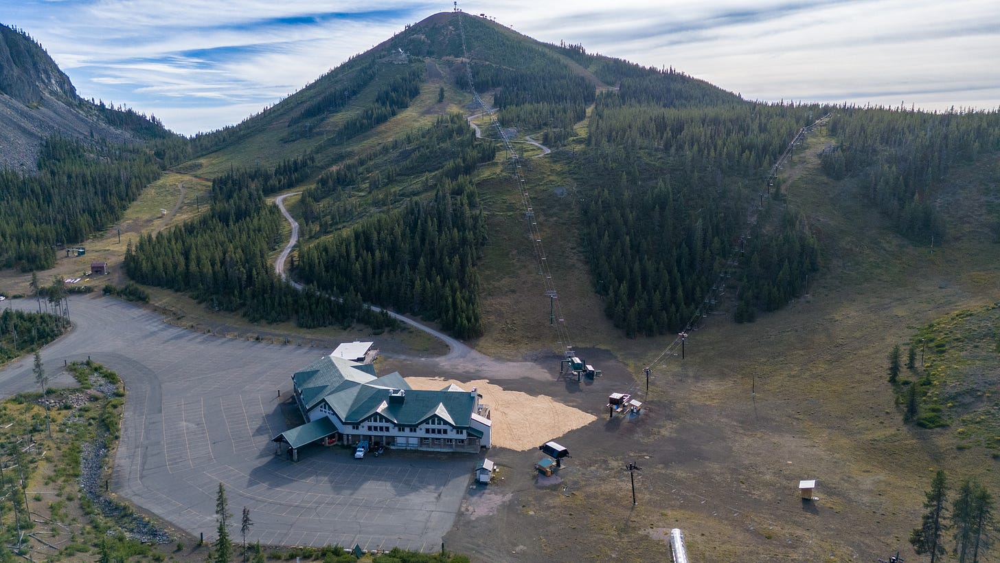 Drone photo of Hoodoo Ski Resort lodge and lifts during summer