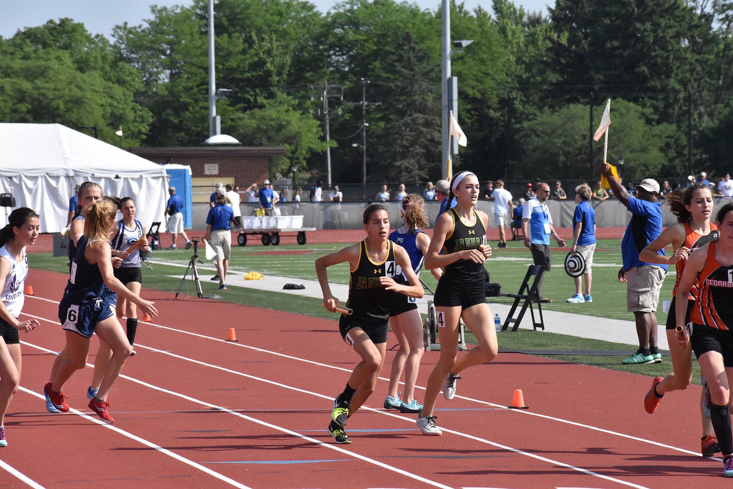 Ashwaubenon girls compete in the D1 3,200 relay. Ashwaubenon girls compete in the D1 3,200 relay.