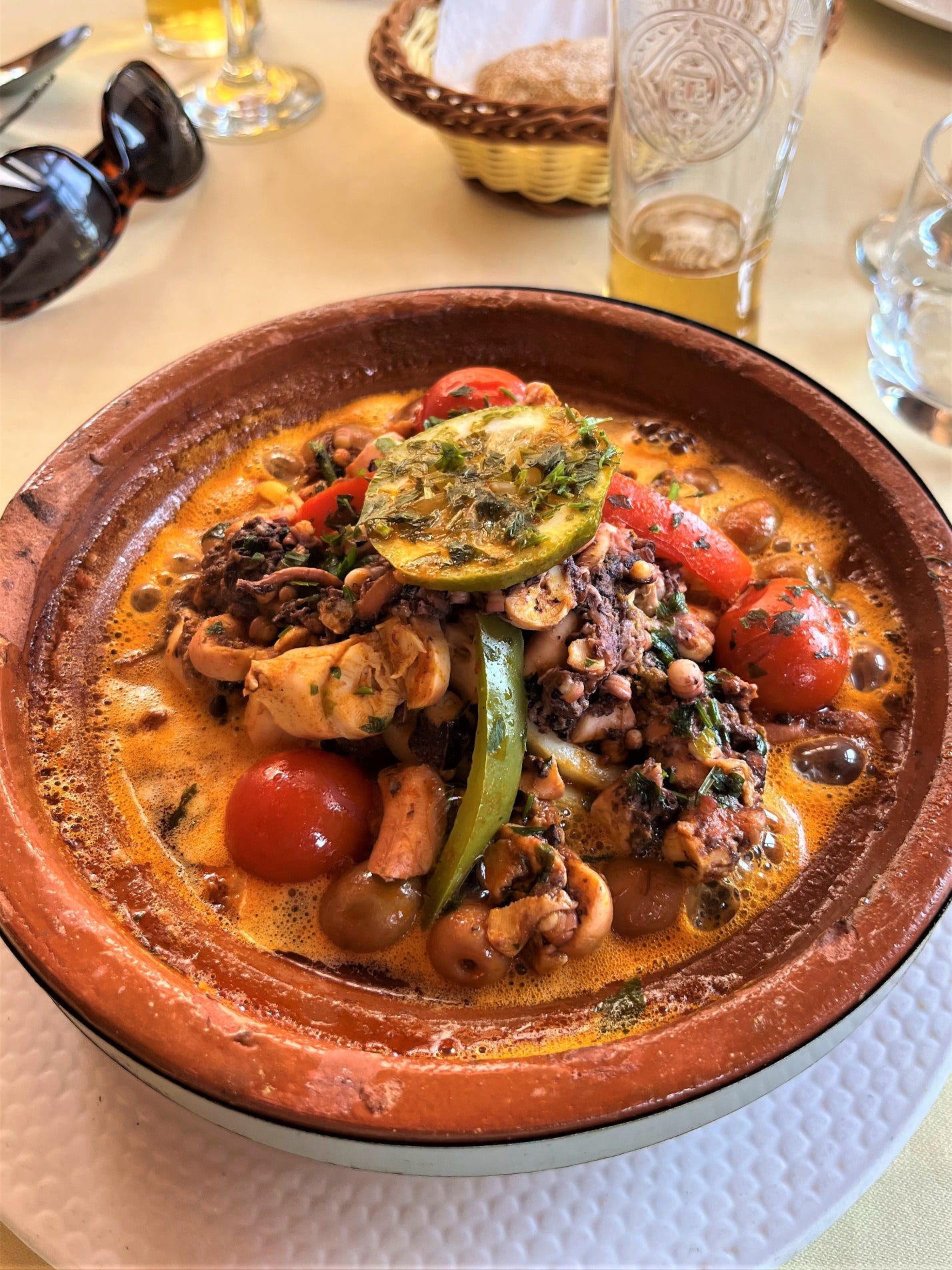 A bowl of food on a table

Description automatically generated