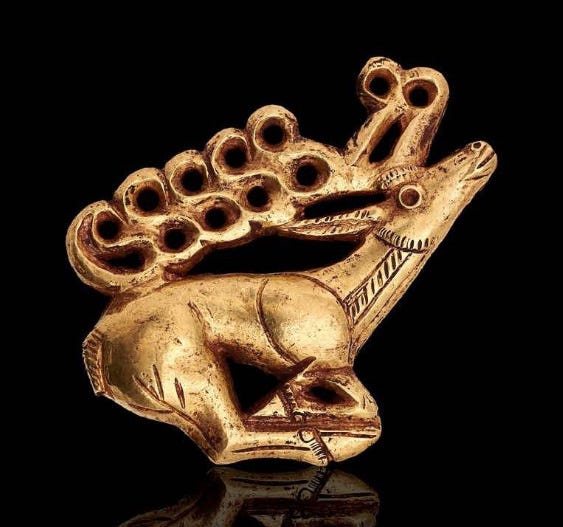 golden carving of a stag golden carving of a stag