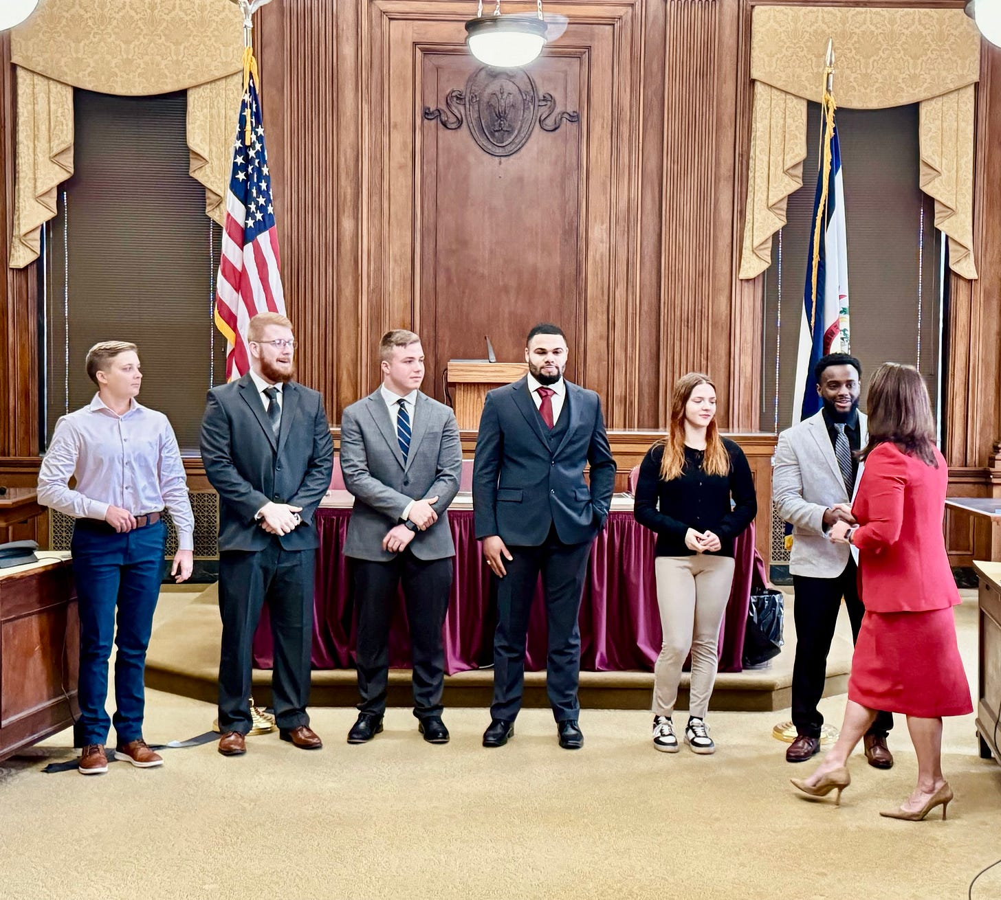 May be an image of 7 people and text