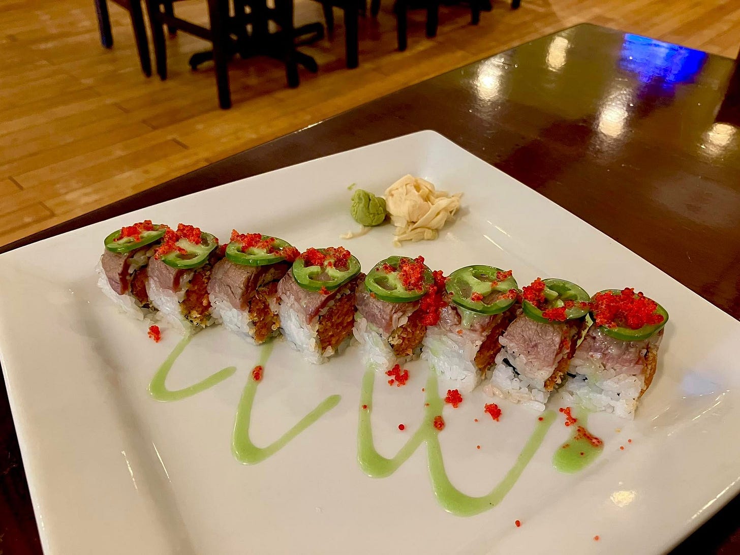 May be an image of sashimi and sushi