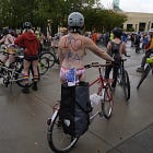 Portland’s nude cyclists take to the streets in protest of militarization