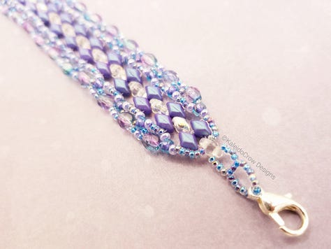 Photos of a beaded bracelet in colors of pale blue, pale purple, and transparant iridescent