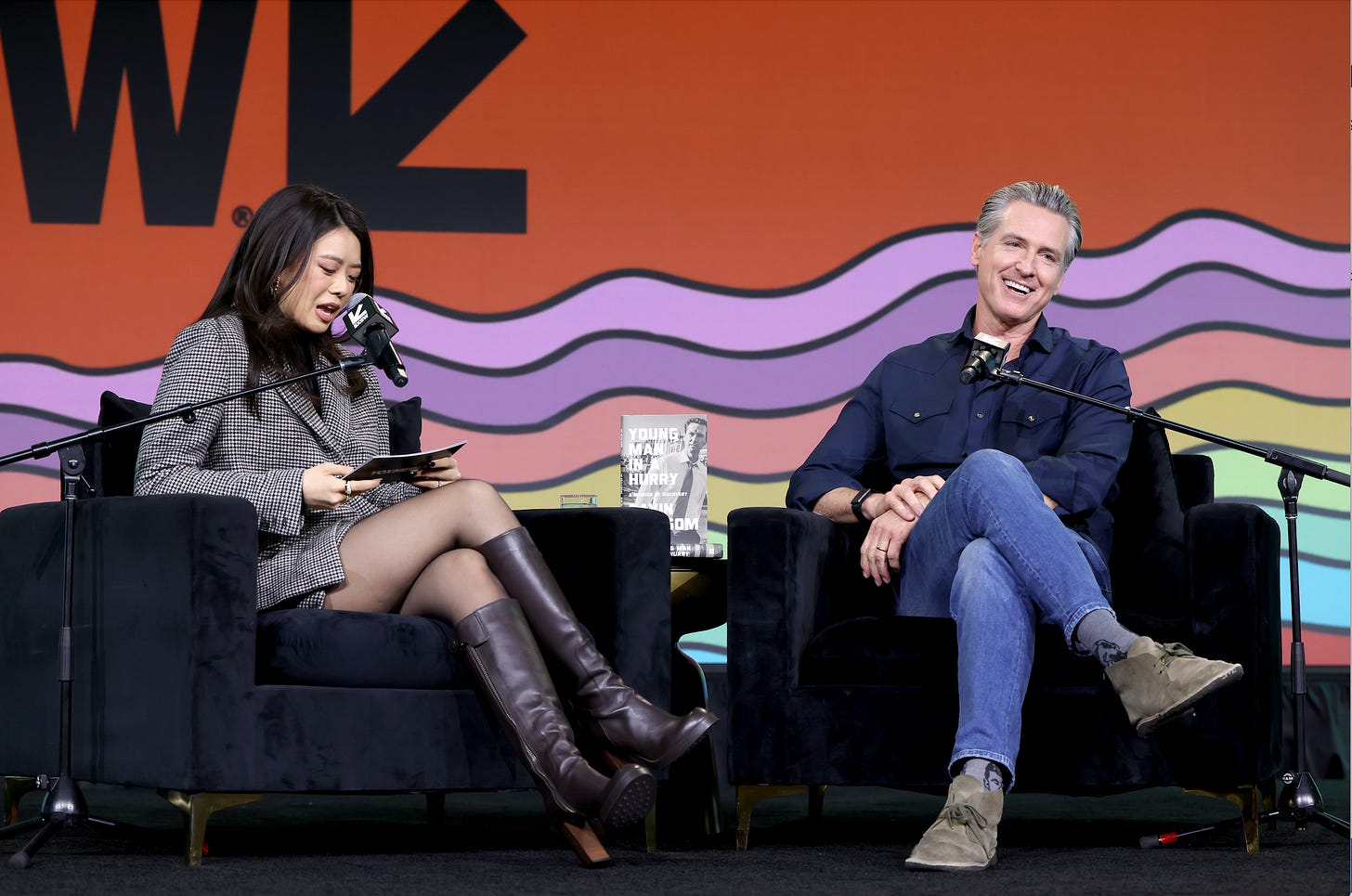 Vivian Tu checks her notes as she interviews Governor Gavin Newsom for her Networth and Chill podcast at the Vox Media Podcast Stage at SXSW Vivian Tu checks her notes as she interviews Governor Gavin Newsom for her Networth and Chill podcast at the Vox Media Podcast Stage at SXSW