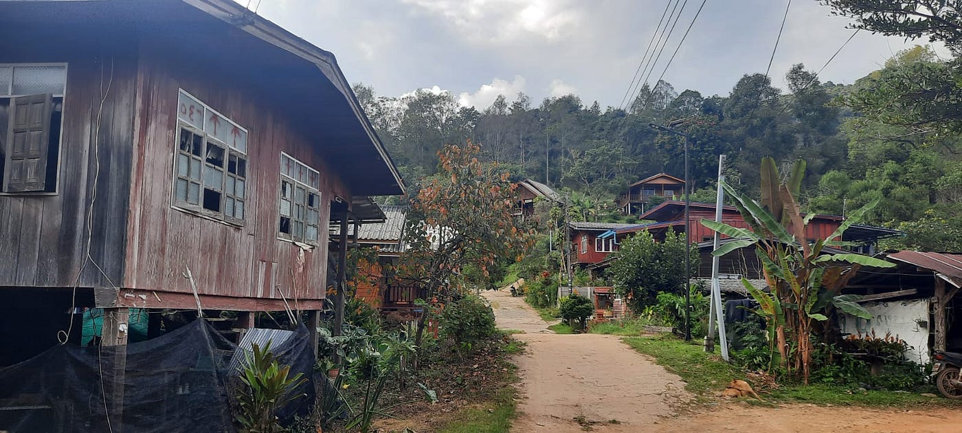 Most houses are on stilts. This village in the mountains is not prone to flooding, so not all the houses are built in that style.