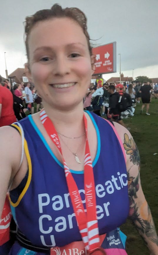 At the GNR finish line with an ominous looking cloud behind me (we all know how that went)