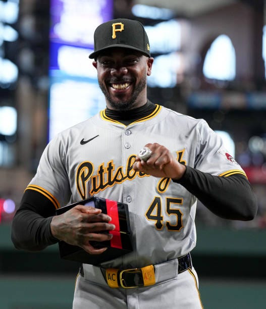 Aroldis Chapman of the Pittsburgh Pirates is presented with his World Series ring before the game against the Texas Rangers at Globe Life Field on...