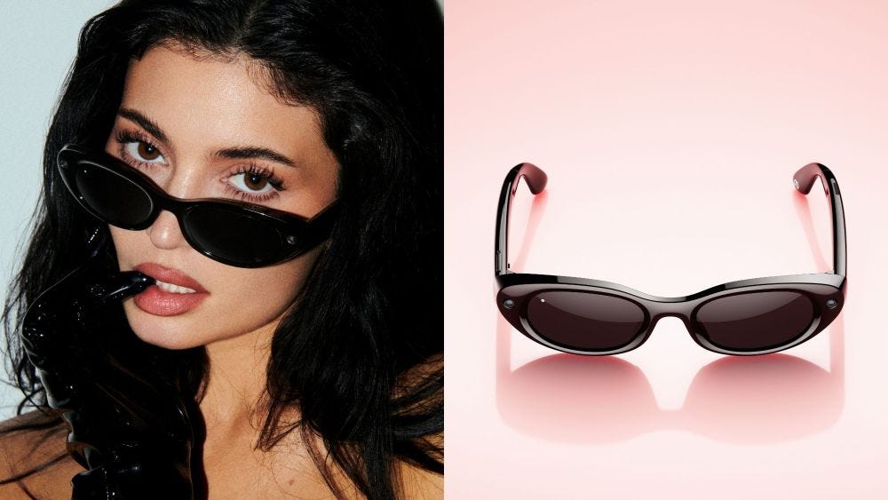 Kylie Jenner wearing new meta AI glasses that she designed; meta starfire glasses kylie edition over pink background; shop meta x kylie smart glasses Kylie Jenner wearing new meta AI glasses that she designed; meta starfire glasses kylie edition over pink background; shop meta x kylie smart glasses