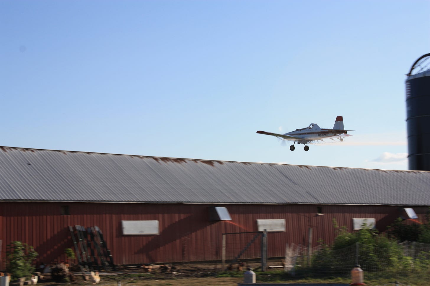 Spray plane over the farm