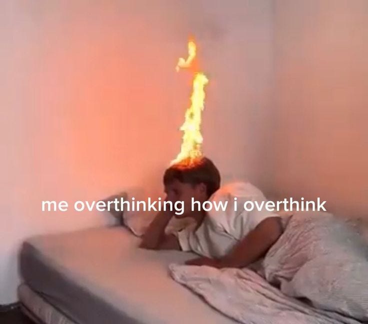 This may contain: a person laying on a bed with flames coming out of the wall behind them that reads me overthiking how i overthink