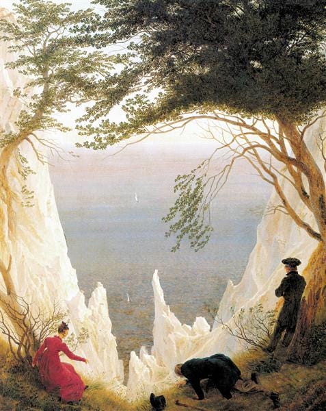 Friedrich painting of three figures looking down white chalk cliffs toward the sea