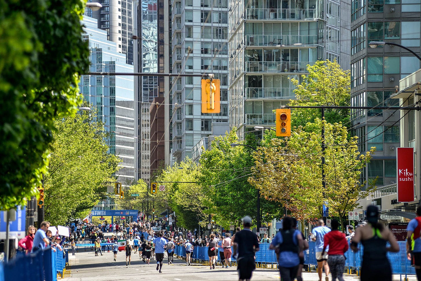 Runners approaching the finish line for the BMO Vancouver half marathon.