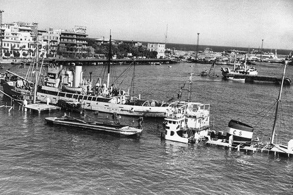 Egyptian ships sunk at the entrance of the Suez Canal at Port Said Egyptian ships sunk at the entrance of the Suez Canal at Port Said