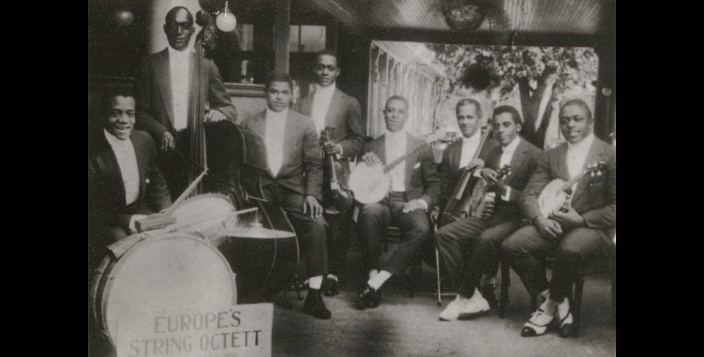 James Reese Europe's "String Octett" in 1916. Schomburg Center for Research in Black Culture, Manuscripts, Archives and Rare Books Division, The New York Public Library. "Europe's String Octett" New York Public Library Digital Collections. James Reese Europe's "String Octett" in 1916. Schomburg Center for Research in Black Culture, Manuscripts, Archives and Rare Books Division, The New York Public Library. "Europe's String Octett" New York Public Library Digital Collections.