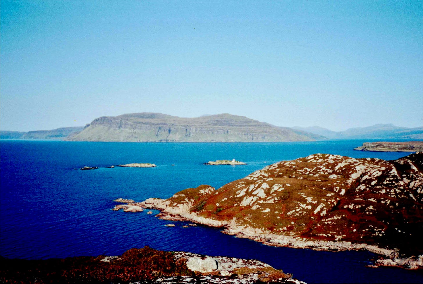 A bay and rocky land formations