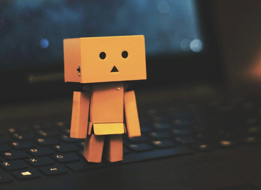 Danbo standing on laptop Danbo standing on laptop