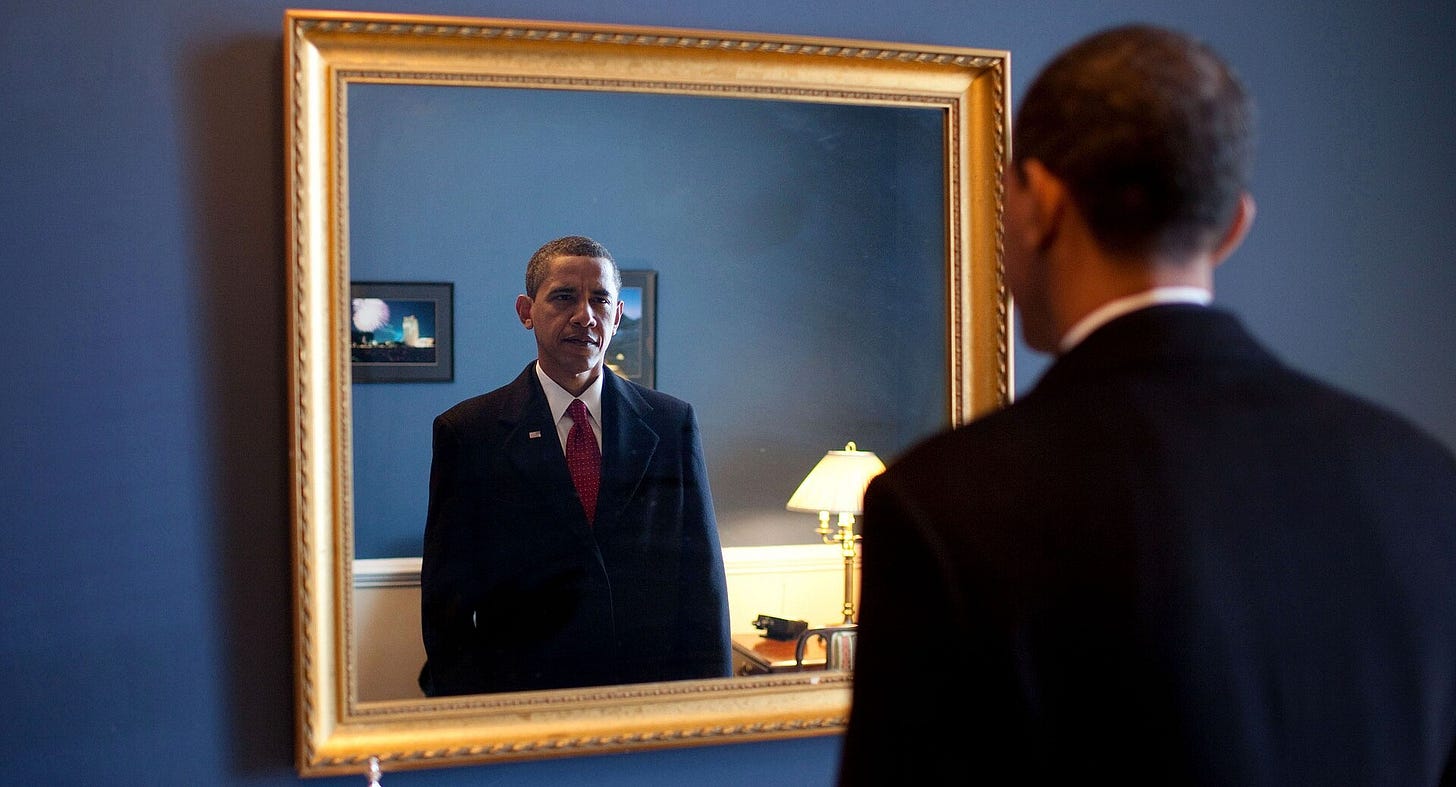 Barack Obama takes one last look in the mirror, backstage before going out to take oath of office, Jan. 20, 2009.