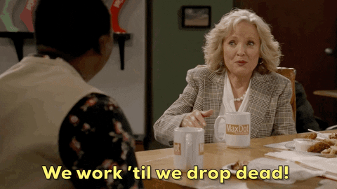 gif of woman saying "we work until we drop dead"