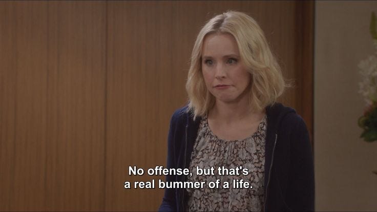 This may contain: a woman standing in front of a door with a quote on it that reads, no offense, but that's a real bummer of a life