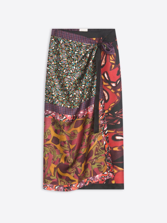 Colorful patterned skirt with a patchwork design on a white background Colorful patterned skirt with a patchwork design on a white background