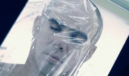 Ryan Reynolds stars as the healthy, young body into which the consciousness of a dying aristocrat (Ben Kingsley) is placed, with disastrous consequences, in "Self/less," a 2015 thriller from Gramercy Pictures directed by Tarsem Singh.